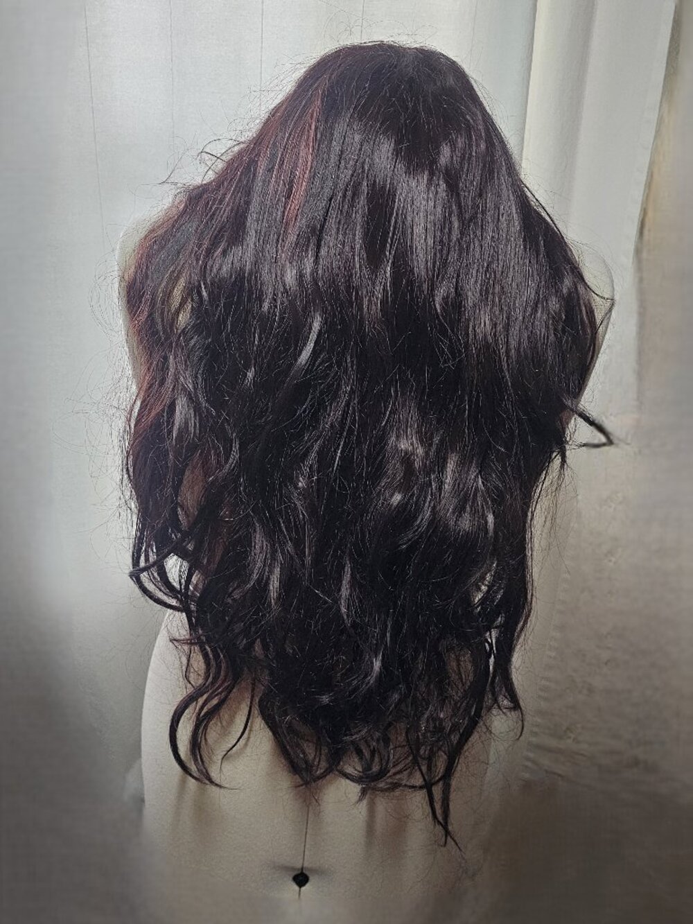 Long, dark brown synthetic hair wig with bangs